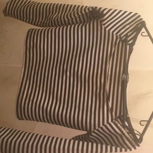 Fitted black and white striped crop top .